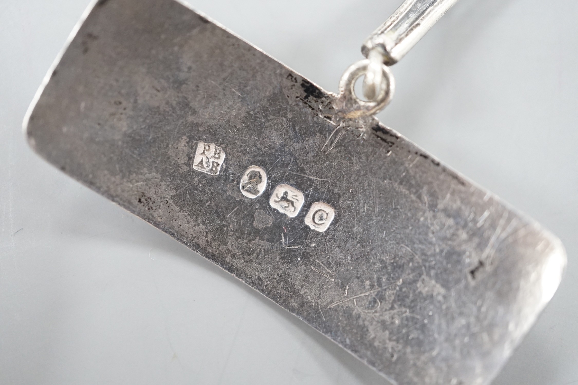 A set of three George silver decanted wine collar labels, Robert Barker, London, 1793 and a pair of similar silver wine label collarettes by Peter & Ann Bateman, London, 1798.